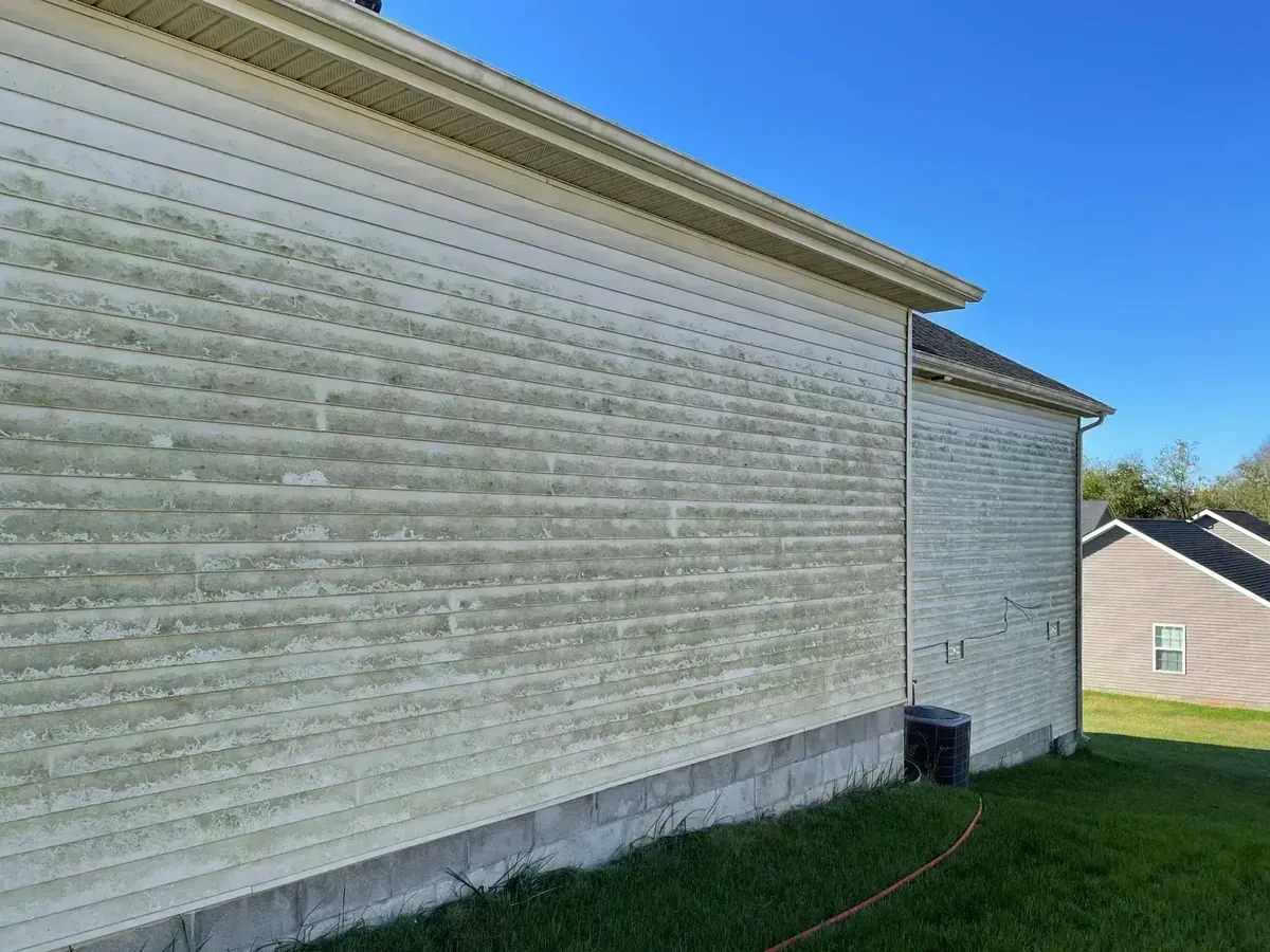 A two-story house in Georgetown, Kentucky, soft washed by Inman Prowash, before